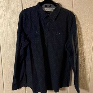 Nice blue button up long sleeve shirt.